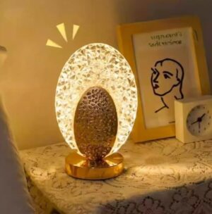 17e13c5c-9702-42fc-a7d8-cc855f0fc760.jpg Oval Crystal LED Table Lamp - مصباح طاولة LED كريستالي بيضاوي الشكل